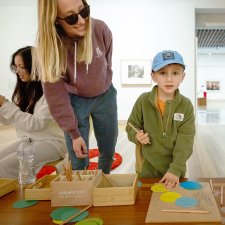 A mother and child playing in the Gallery