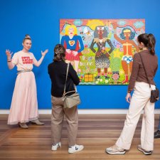 A group of people looking at Do you Believe in Love? 2025 by Kaylene Whiskey