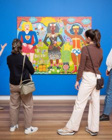 A group of people looking at Do you Believe in Love? 2025 by Kaylene Whiskey