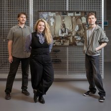 Art Handlers standing with their selected winning photograph