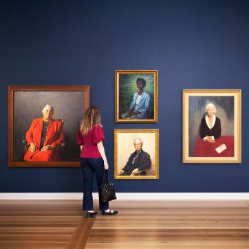 Visitor in the exhibition, May 2026, featuring works by Robert Hannaford, Clif Peir, Lyall Trindall and Ivy Shore