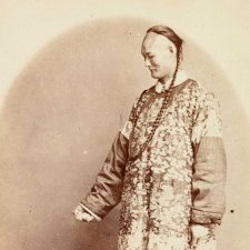 Chang the Chinese giant with his manager cowering on the floor