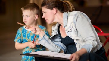 A mother and child drawing