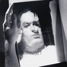 David Potts reflected in a magazine page