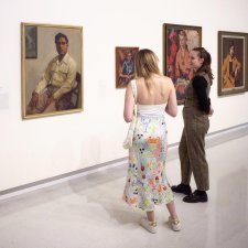 Visitors looking at Harold Blair, 1948 by Ernest Buckmaster. Purchased 2010 © Estate of Ernest Buckmaster