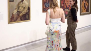 Visitors looking at Harold Blair, 1948 by Ernest Buckmaster. Purchased 2010 © Estate of Ernest Buckmaster