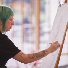 Drawing at an easel