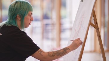 Drawing at an easel