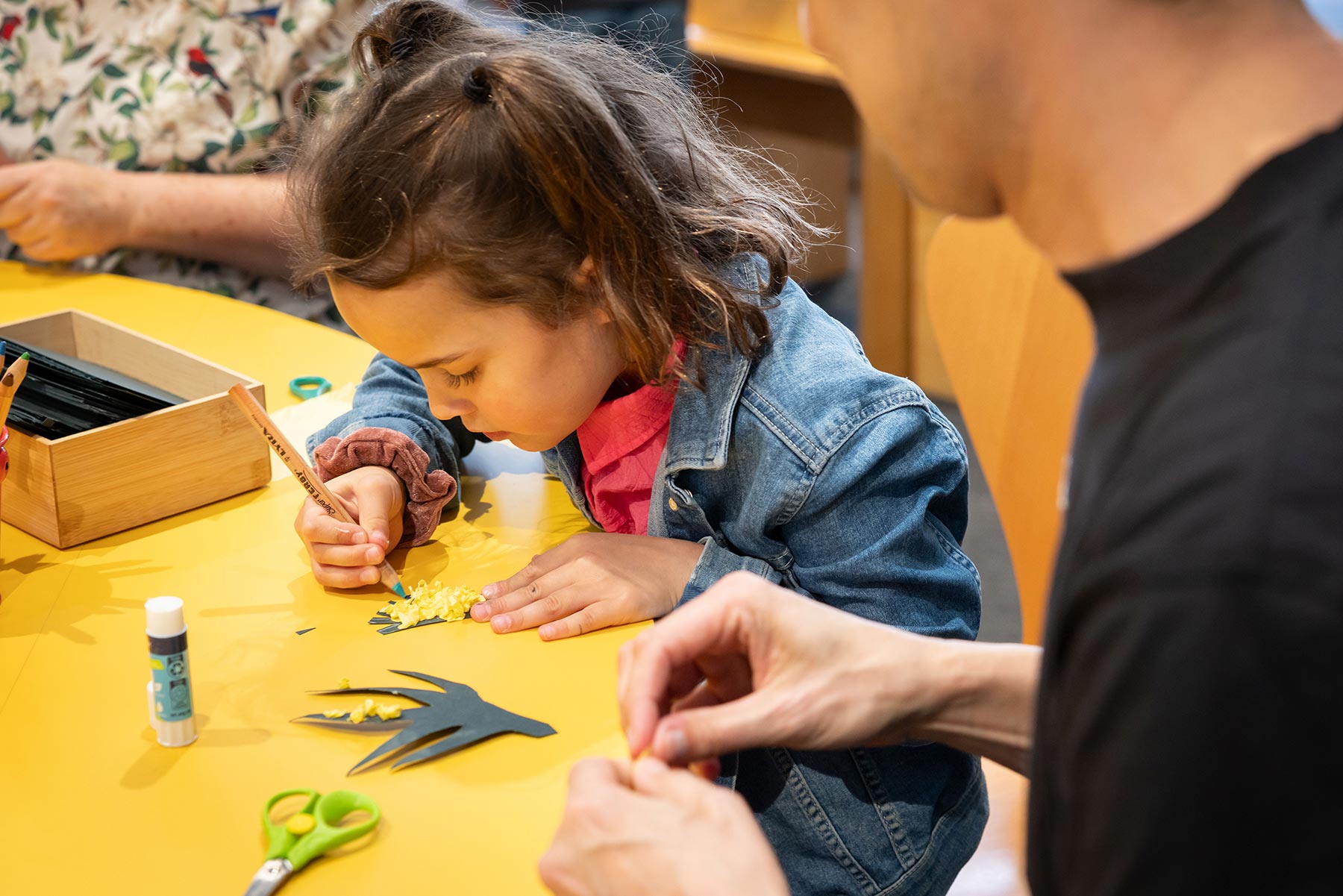 Drawing and art activities on a wooden table